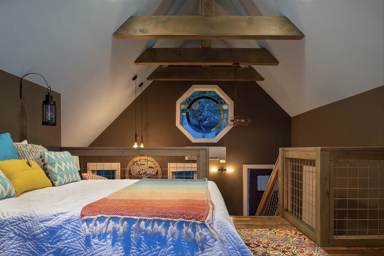 The Aerie bedroom and round window