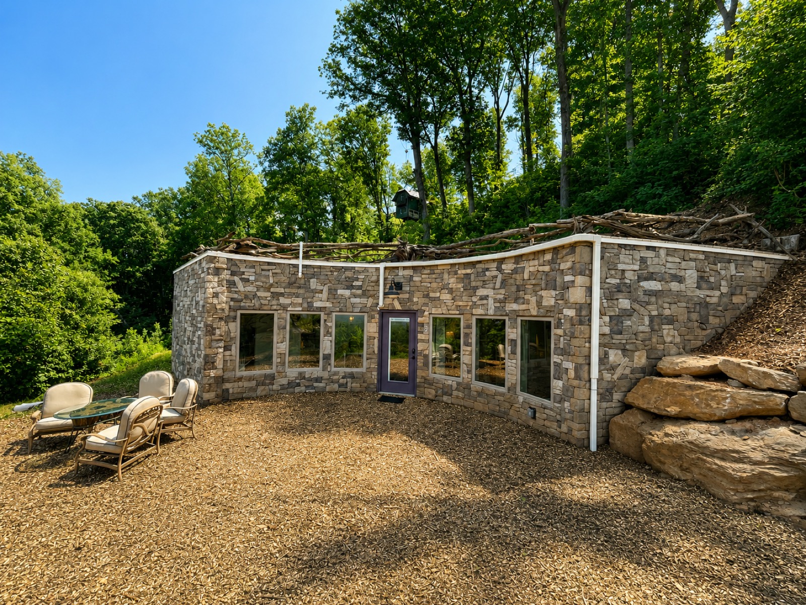 Crater dwelling exterior set into the mountain